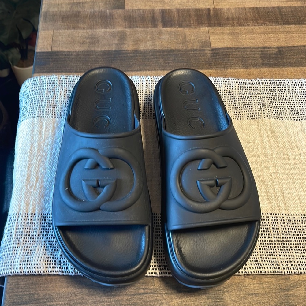 Black Gucci platform slides